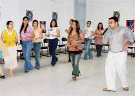 Youngsters taking Salsa classes in city