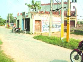 A post office at the entrance of PUDA-approved Preet Vihar in Amritsar.