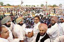 The Chief Minister, Capt Amarinder Singh, PCC chief S. S. Dullo and AICC general secretary J. Dwivedi along with ministers at the Congress rally in Ludhiana on Tuesday
