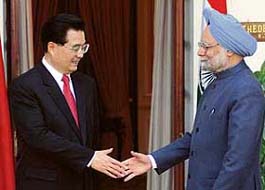 Chinese President Hu Jintao shakes hands with Prime Minister Manmohan Singh before their official meeting at Hyderabad House in New Delhi
