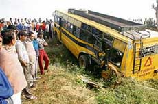 Arya College bus which was hit by the Dhanbad Express at an unmanned railway crossing in Gumtala village near Noormehal in Jalandhar on Thursday morning. 