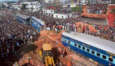  A coach of the Jamalpur-Howrah Superfast Express lies crushed when an overbridge fell on it in Bhagalpur on Saturday