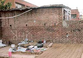 Kitchenware laid out along a tandoor in Sector 34 in Chandigarh