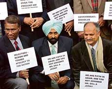 Former hockey players take out a protest march against the Indian Hockey Federation (IHF) in New Delhi on Wednesday.