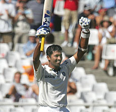 Wasim Jaffer celebrates his century on the first day of the third Test against South Africa at Newlands in Cape Town on Tuesday.