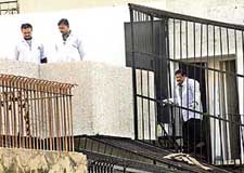 Doctors from AIIMS and CBI team members inspect the residence of Moninder Singh Pandher at Noida on Friday