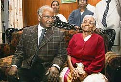 Chief Justice of India-designate K.G. Balakrishnan chats to his mother K.M. Sarada at his residence in New Delhi