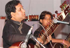 Sayeed Khan and his son, Adnan Khan, perform at Banarsi Dass Arya Girls College in Jalandhar cantonment