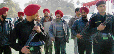 Mr Shamsher Singh Dullo, Punjab Congress chief, heads for an election rally of the Kharar candidate, Mr Balbir Singh Sidhu, in Mohali on Wednesday. 