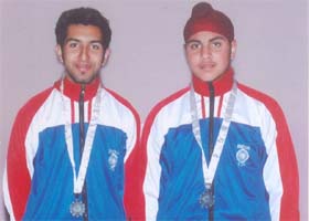Ravi Dhir and Gurpreet Singh Bajwa, both students of Dayanand Model School, Model Town, who have won two bronze medals at the Indo-Nepal International Table Soccer Championship held at Viratnagar in Nepal recently