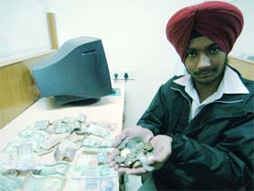 Bhupinder shows his collection of currency of various countries