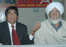 Dr Joginder Dyal (left), member, national executive of the CPI, and Prof Balwant Singh, state secretary of the CPM, at a joint press conference in Chandigarh on Sunday.