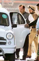 Punjab Chief Secretary K.R. Lakhanpal and DGP R.S. Gill come out of Nirvachan Sadan in New Delhi on Monday