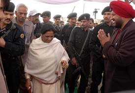 BSP candidate Gurmel Singh Pehalwan greets Ms Mayawati on her arrival in Ludhiana on Monday