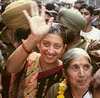 TV actor Smriti Irani with Ms Laxmi Kanta Chawla, BJP candidate for the Amritsar Central constituency, during a road show in Amritsar on Thursday.