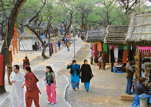 The mela provides a rural setting with mud-baked hutments