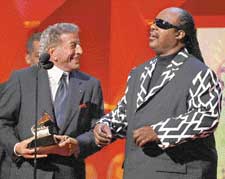 Tony Bennett and Stevie Wonder accept the Grammy for Best Pop Collaboration With Vocals for For Once In My Life