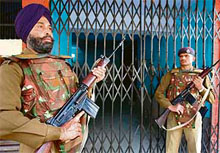 Security personnel guarding the EVMs at counting centre in Rajpura