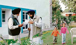 Capt Kanwaljit Singh and his son Jasjit Singh Bunny share some information at their house in Chandigarh