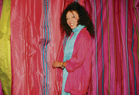 Director of British interior design company Designers Guild Tricia Guild displays fabrics and wallpaper at a product launch in New Delhi