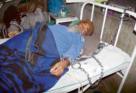 Gurdev Singh chained to the bed at Government Rajindra Hospital in Patiala.