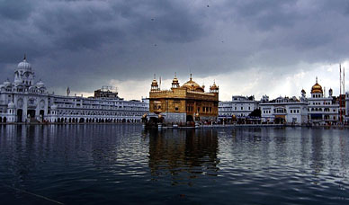 The Golden temple is pictured under a brooding sky as rain fell continuously for the past 24 hours in Amritsar on Wednesday. Nevertheless, devotees still came in large numbers.