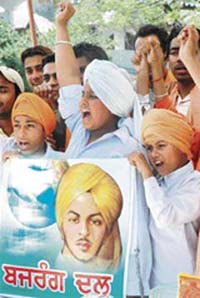Members of the Bajrang Dal dressed as Bhagat Singh, Rajguru and Sukhdev during a Martyrdom Day function in Patiala