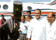 Union minister for civil aviation Praful Patel flanked by Air Deccan managing director Capt Gopinath at the Kangra airport.