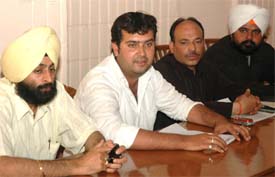 Office-bearers of the Jalandhar Outdoor Advertisers Association address a press conference in Jalandhar on Wednesday