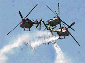 Dhruv helicopters of the Sarang team execute a split