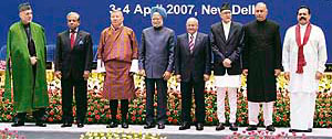 Afghan President Hamid Karzai, Bangladesh Government’s chief adviser Fakhrudeen Ahmed, Bhutan Prime Minister Lyonpo Khandu Wangchuk, Prime Minister Manmohan Singh, President of the Maldives Maumoon Abdul Gayoom, Nepalese Prime Minister Girija Prasad Koirala, Pakistani Prime Minister Shaukat Aziz and Sri Lankan President Mahindra Rajapakse pose for photographers