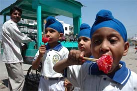 CHILL FACTOR: Schoolchildren enjoying ice-candies in Amritsar on Tuesday