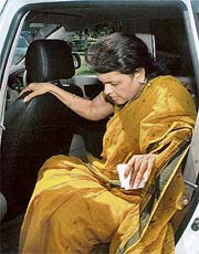 Rekha Mahajan, wife of Pramod Mahajan, arrives at a sessions court in Mumbai