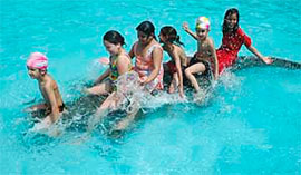 Children enjoy at a fun park in Patiala.