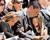 Mourners attend a memorial service for Reema Samaha, one of the 32 persons killed during the shootings at Virginia Tech, at St. Timothy Catholic Church in Chantilly, Virginia.