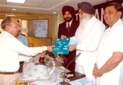 Chief Minister Parkash Singh Badal releasing eco-freindly recycled copies paper at Khanna Paper Mills in Amritsar.