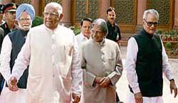 President A.P.J. Abdul Kalam, Vice-President B.S. Shekhawat, Lok Sabha Speaker Somnath Chatterjee, Prime Minister Manmohan Singh and I&B Minister Priya Ranjan Dasmunshi arrive at the courtyard of Parliament House in New Delhi