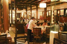 Dim lights, excellent food and great music are the hallmark of these bars