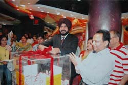 BJP MP Navjot Singh Sidhu takes out the draw in Amritsar.