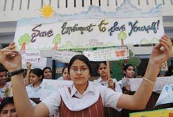 Students of various city schools display placards with messages of ‘Save Mother Earth’ to mark World Environment Day in Amritsar