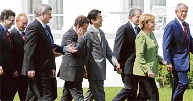 MOVING FORWARD: G8 Heads of State arrive for a family picture in front of the Kurhaus building in Heiligendamm, northeastern Germany, during their first working session