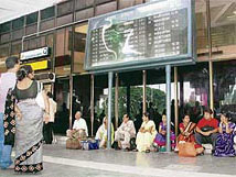 Passengers stranded at Netaji Subhas International Airport, Kolkata, on Wednesday due to strike by thousands of baggage handlers, check-in staff and other employees of Indian.