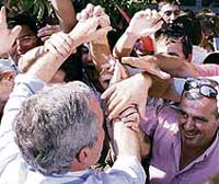 Bush glad-handled in Albania.