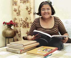 Himanshi Makkar going through her books .