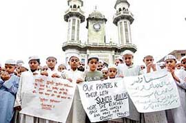 Students of Nusrat-ul-Islam madarsa of Imam Nasir Jama Masjid pray in Jalandhar on Sunday for Sunita Williams’ safe return.