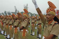 New recruits take oath after completion of their training during a passing out parade at PAP training centre in Jalandhar on Tuesday