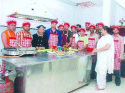 Students learn cooking skills during a 15-day summer camp in Jalandhar