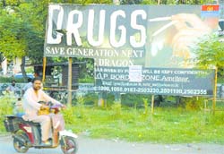 Hoardings put up by the anti-narcotics cell of Punjab police are in a dilapidated state