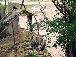 The stone crusher on the Pathakot-Dalhousie road that was washed away by the flooding Chakki river in Pathankot on Sunday