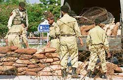 Pakistan army soldiers set up new bunkers near Lal Masjid in Islamabad